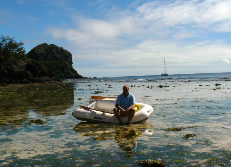 New dinghy, beached on coral as the tide goes out!