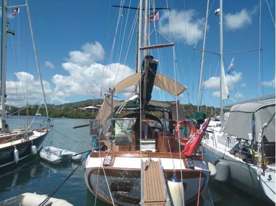 A boat docked at a pier

Description automatically generated with low confidence