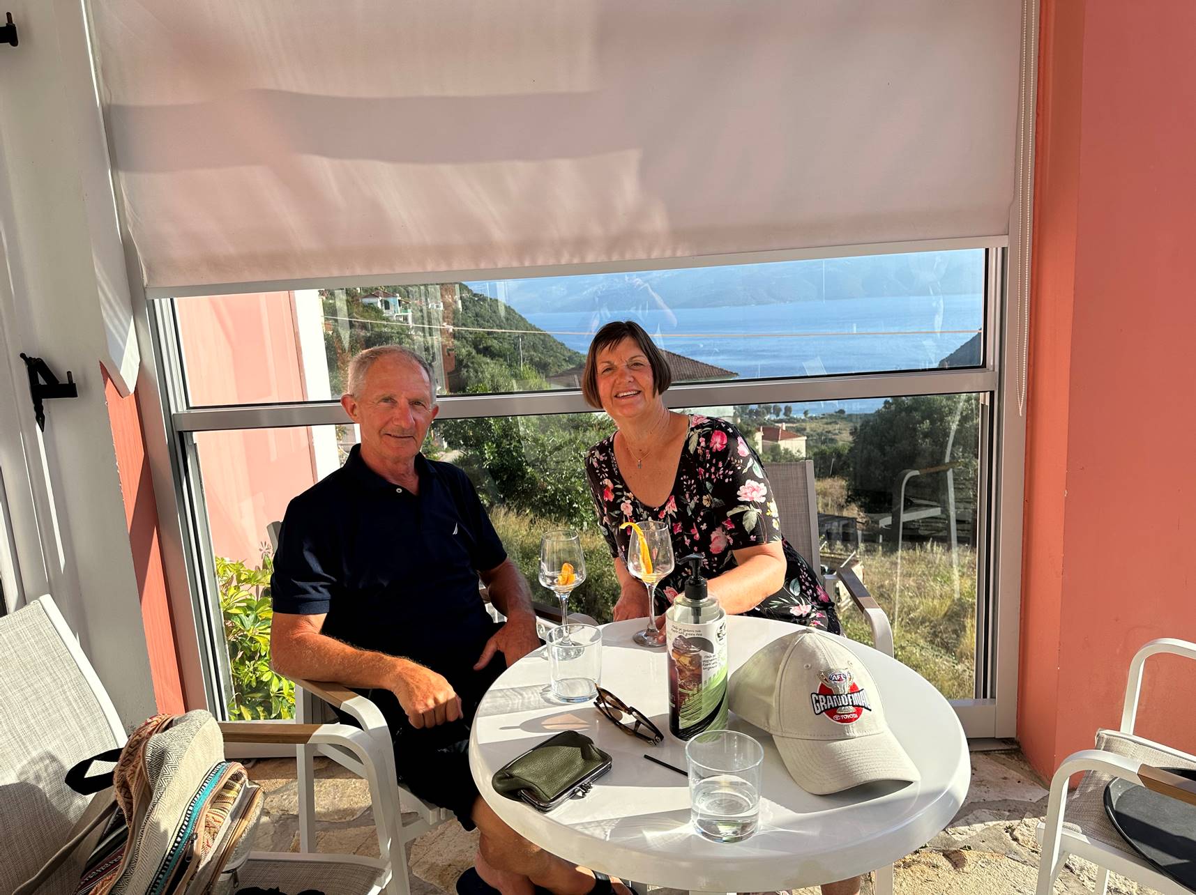 A person and person sitting at a table

Description automatically generated