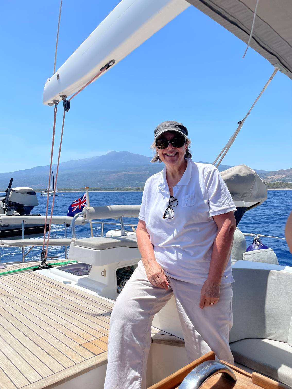 A person standing on a boat

Description automatically generated